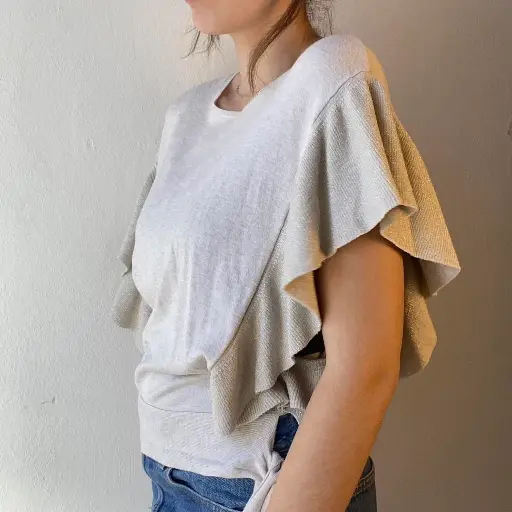 Top maille à volants